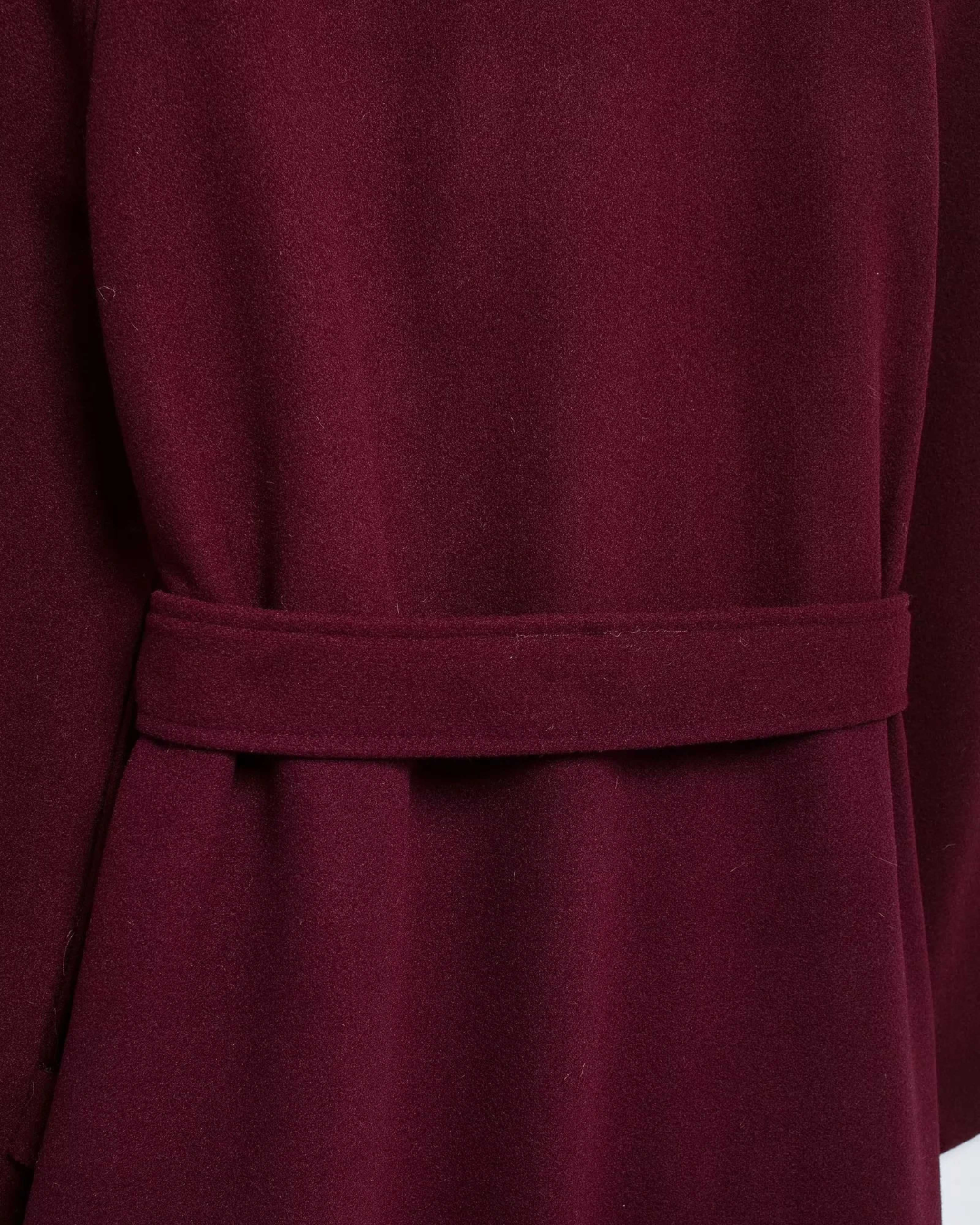 Self-fabric belt on the burgundy tricot trench coat